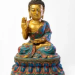 Seated Buddha, gilt face and hands, robes in cloisonné enamel.