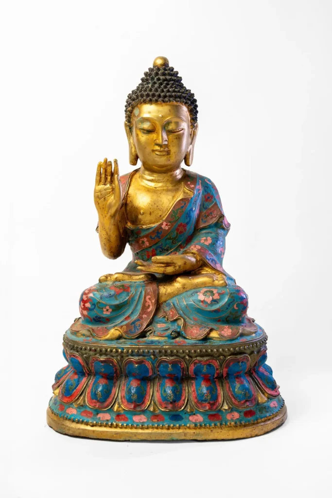 Seated Buddha, gilt face and hands, robes in cloisonné enamel.